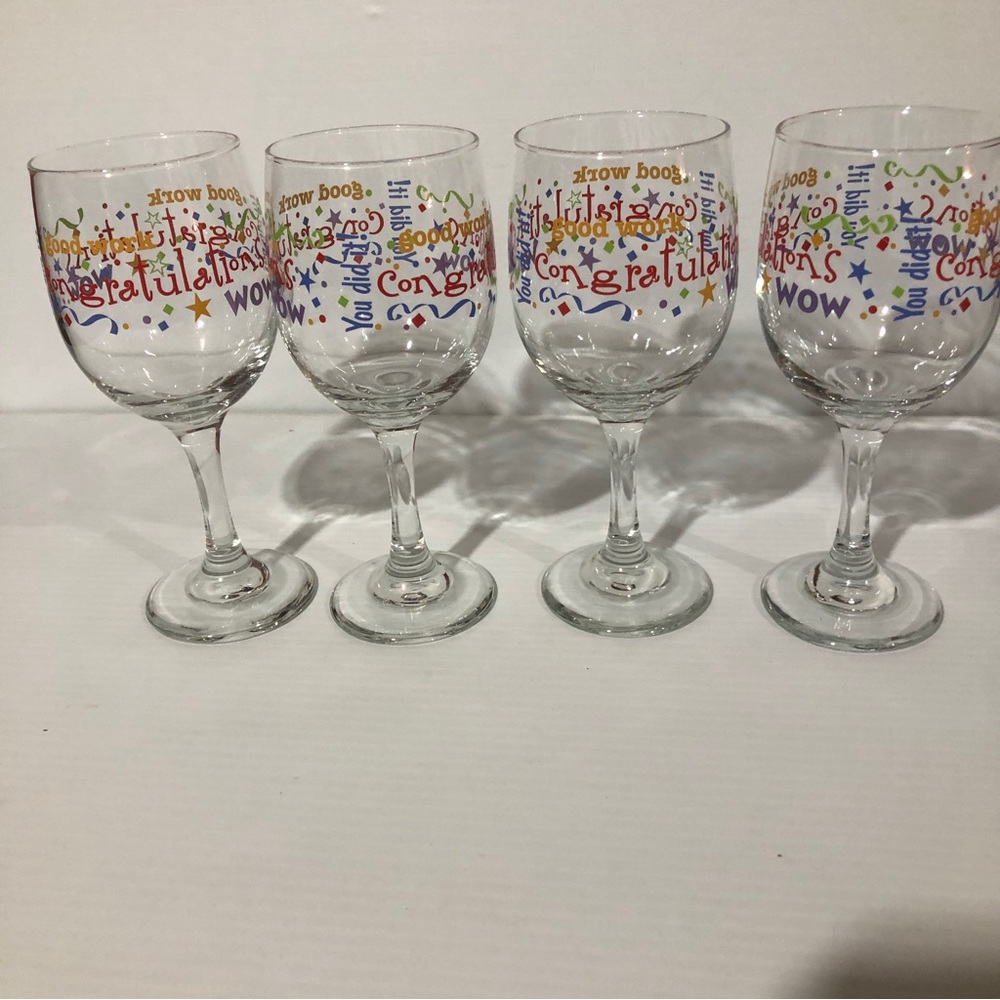 4 Pcs of Congratulations wine glasses. Made in US New without tags